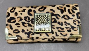 A faux leopard skin purse by Biba or London