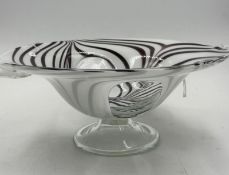 A Murano glass swirl pattern bowl on single foot.