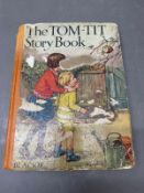 A vintage hardback copy of The Ton Tit story book