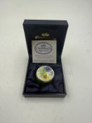 A crummeles Enamel pill box with floral decoration