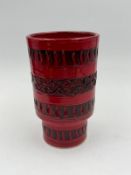 A Bitossi ceramic vase in red glaze with intricate geometric detailing. Height 16cm.