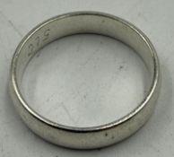 A silver band style ring marked 925 size S1/2