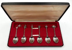 A boxed silver jubilee silverplated spoon set.