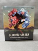 A boxed Bloomchasers 3d boardgame