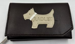 A Radley purse in brown.