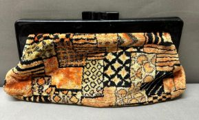 A Vintage 1960's carpet clutch handbag