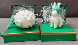 Jonathan Adler Rabbit and Pufferfish porcelain decorations.