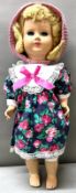 A Vintage Liala Bambola Doll in kitted bonnet.