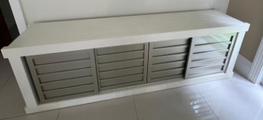 Contemporary low profile unit with slatted grey sliding doors H80cm W250cm D50cm