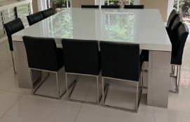 Large square table, glass top on chrome square legs and chairs