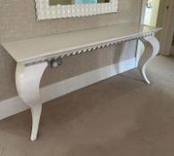A white console table on contemporary legs H79cm W180cm D50cm