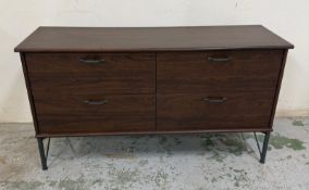 A contemporary dark wood veneer chest of drawers H65cm W118cm D38cm