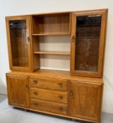 An Ercol Windsor modular sideboard and display cabinet H161cm W155cm D43