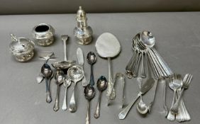 A selection of silver plate and EPNS flatware and a cruet set.