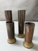 Four brass and copper vases H20cm