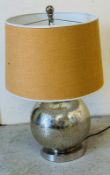 A pair of contemporary mirrored table lamps, untested