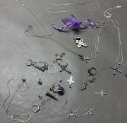A selection of loose silver jewellery various styles and finishes to include necklaces, pendants