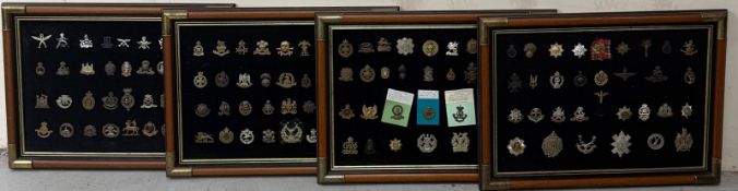 A large selection of Military Cap Badges and insignia set in four frames (Each Frame Approximately