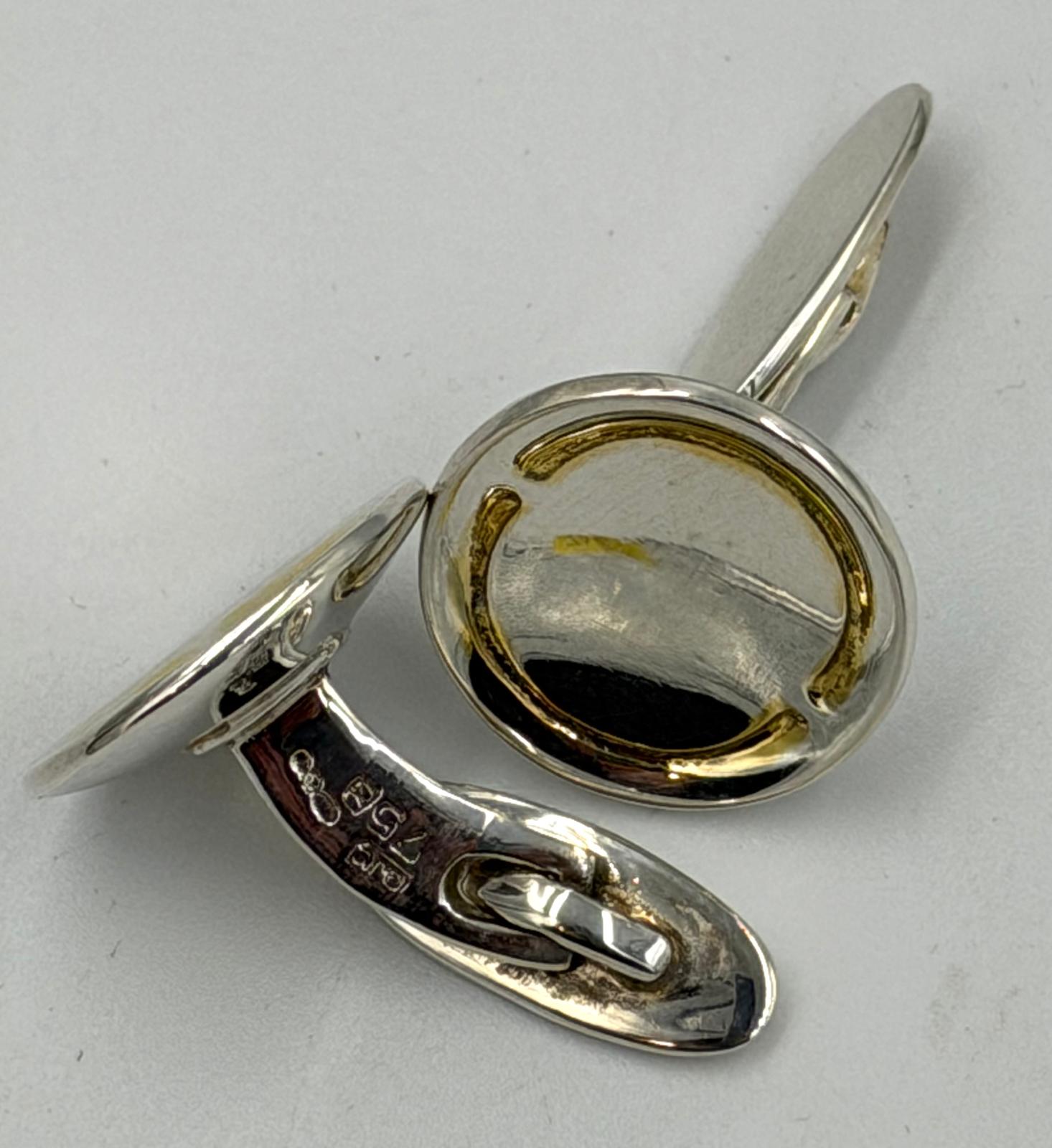 A pair of circular silver Georg Jensen cuff links - Image 2 of 2