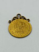A George III half sovereign dated 1817, with pendant mount approximate weight 4.5g