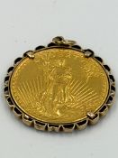 A 1915 Liberty American Twenty dollar coin in a 9ct gold mount. Approximate combined weight 37.3g