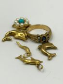 A selection of 9ct gold jewellery items to include, fashion ring, dolphin pendants etc,