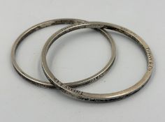 Two silver bangles, marked for Tiffany and Co