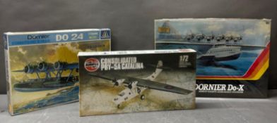 Three boxed model kits an Airfix PBY-5A, Italeri Dorrier and a Matchbox Dornier PO-X