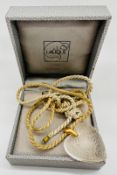 A Lalique heart on a fabric rope style necklace
