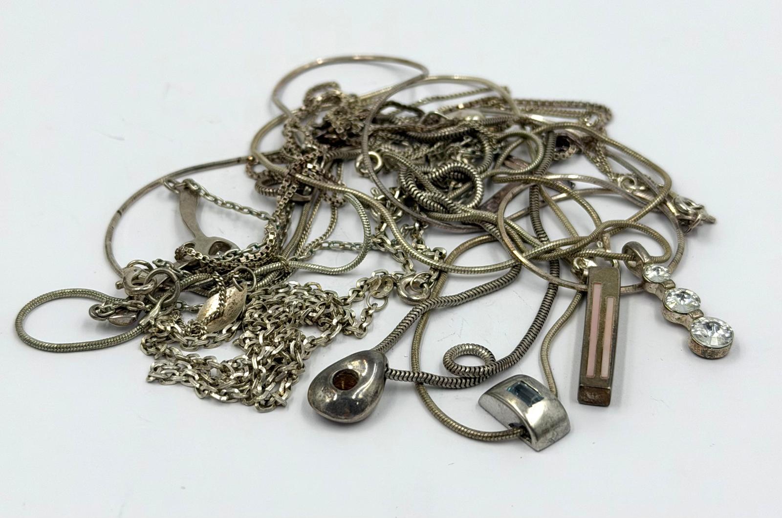 A selection of silver necklaces, varying styles and makers, approximate weight 45g.