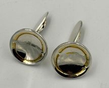 A pair of circular silver Georg Jensen cuff links