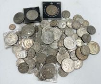 A selection of coins of various denominations and ages to include silver coins