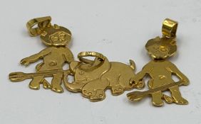A selection of three 9ct gold pendants, an elephant and two devils, approximate weight 5.2g