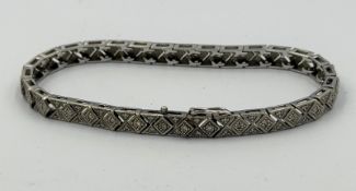 A 9ct white gold pave diamond style bracelet, approximate weight 14.1g