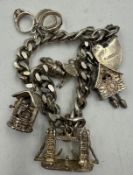 A silver charm bracelet hallmarked for Birmingham, various makers and years