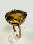 A 9ct yellow gold set citrine, cocktail style ring approximate weight 5.8g and size P.