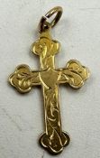 A 9ct gold cross pendant 0.5g