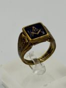 A masonic ring, in brass size Z, with onyx style stone and emblem.