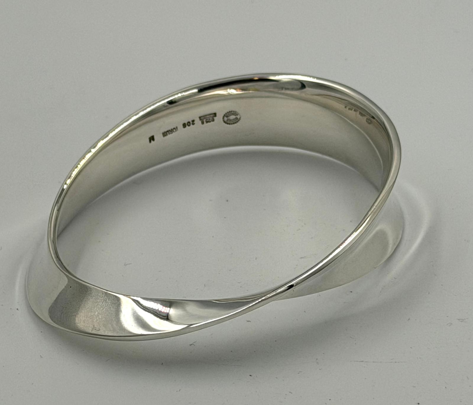 A Georg Jensen silver bangle, with twisted design approximate weight 53g and approximate width 76mm - Image 3 of 3