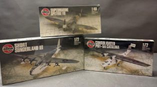 Three Airfix model kits, a Supa Marine Spitfire, a Consolidated PBY, a Catalina and a Short