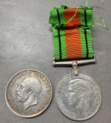 A George V British war medal awarded to 36186 Corporal H Stevens together with a 1939-45 Defence