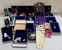 A quantity of boxed quality costume jewellery various styles