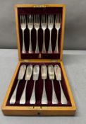A six-place silver plate canteen of fish cutlery