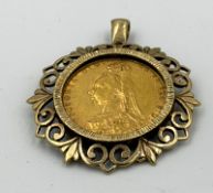 A Victorian 1890 sovereign in decorative 9ct gold mount, approximate weight 12.7g