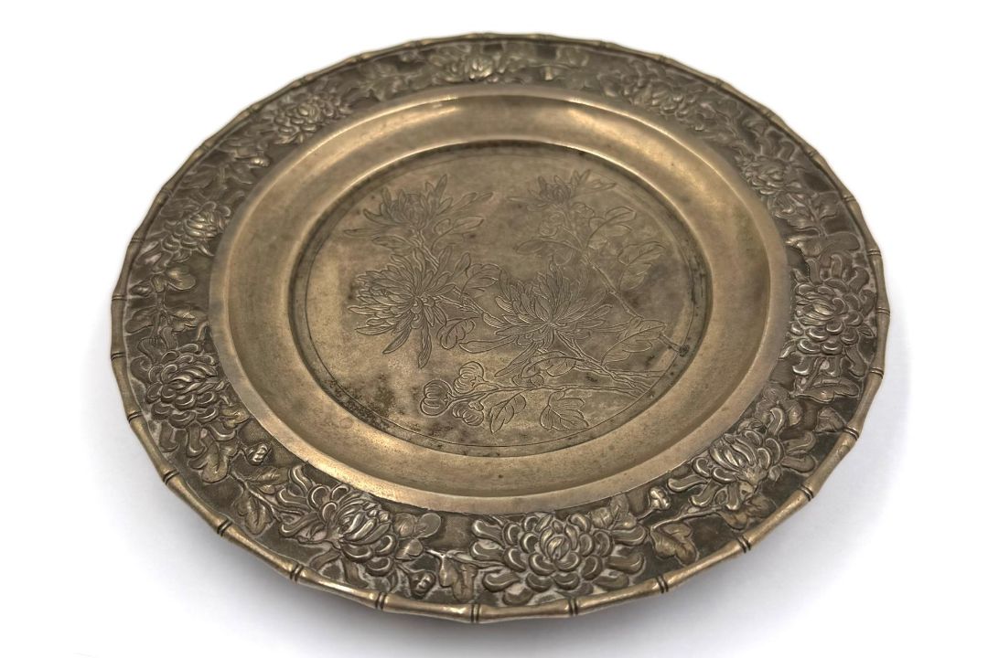 A Chinese silver tea stand on three feet, hallmarked to base with floral design, approximate - Image 1 of 2