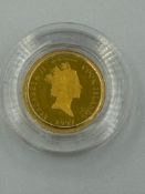 A Cook Island 1/25th of an oz gold coin marked 9999