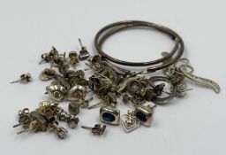 A large selection of silver earrings to include hoops, studs etc approximate weight 35g.