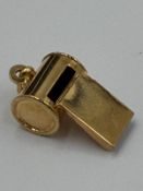 A 9ct gold whistle charm approximate weight of 2.4g