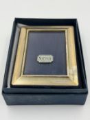 A hallmarked silver picture frame, 9cm x 12cm by Carrs of Sheffield boxed