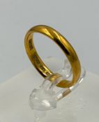 A 22ct wedding band approximate weight 3.5g and size M
